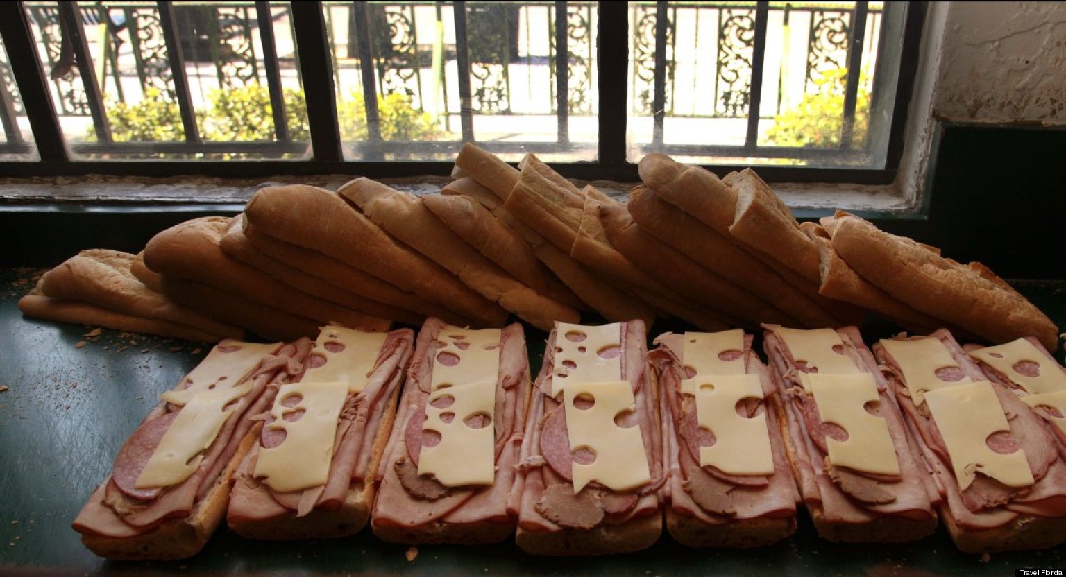 Rows of Cuban sandwiches with ham, salami, and Swiss cheese on Cuban bread at La Segunda Central Bakery in Ybor City