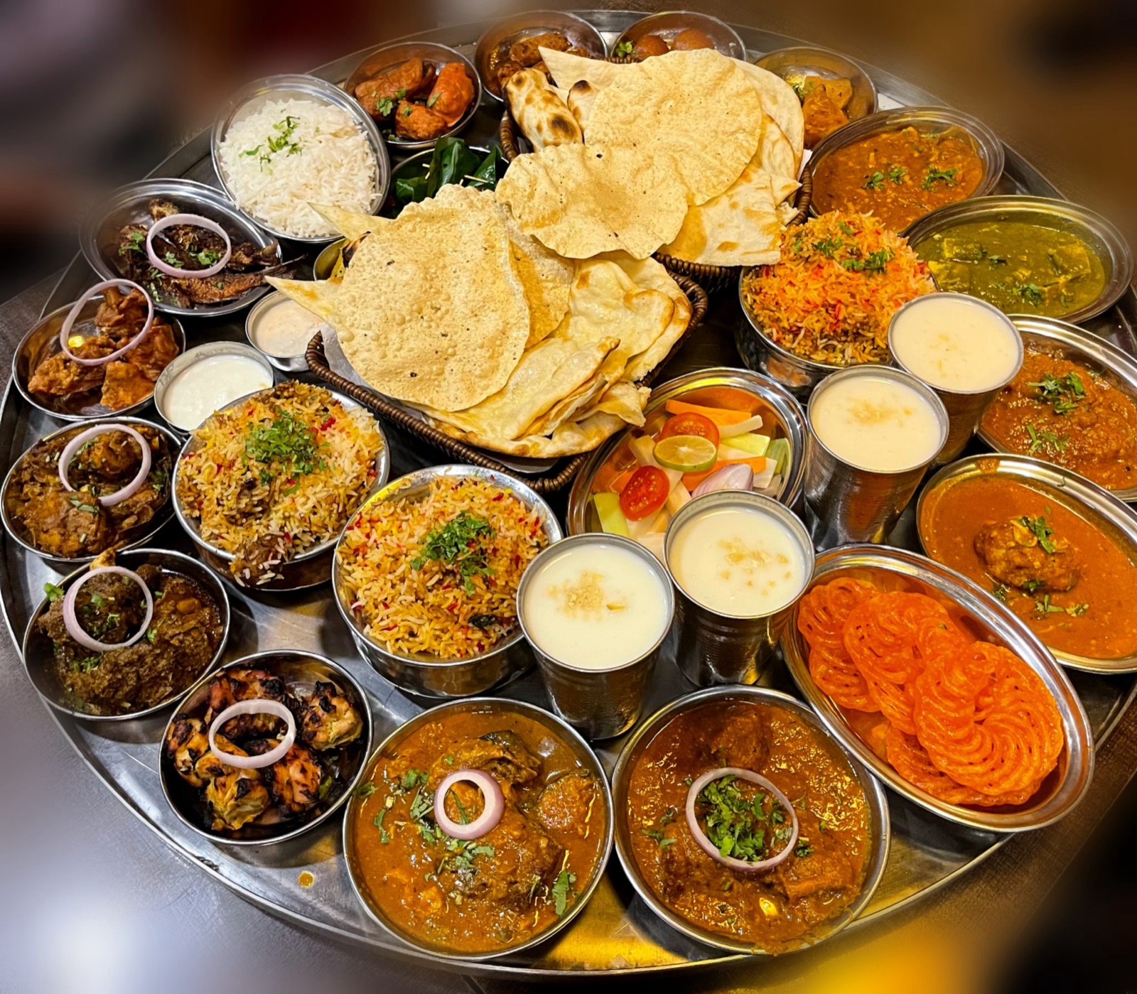 A plate of South Indian chicken biryani with rice and spices
